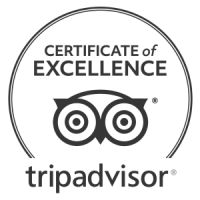 A circular TripAdvisor “Certificate of Excellence” seal with binocular logo, and the word “tripadvisor” below.